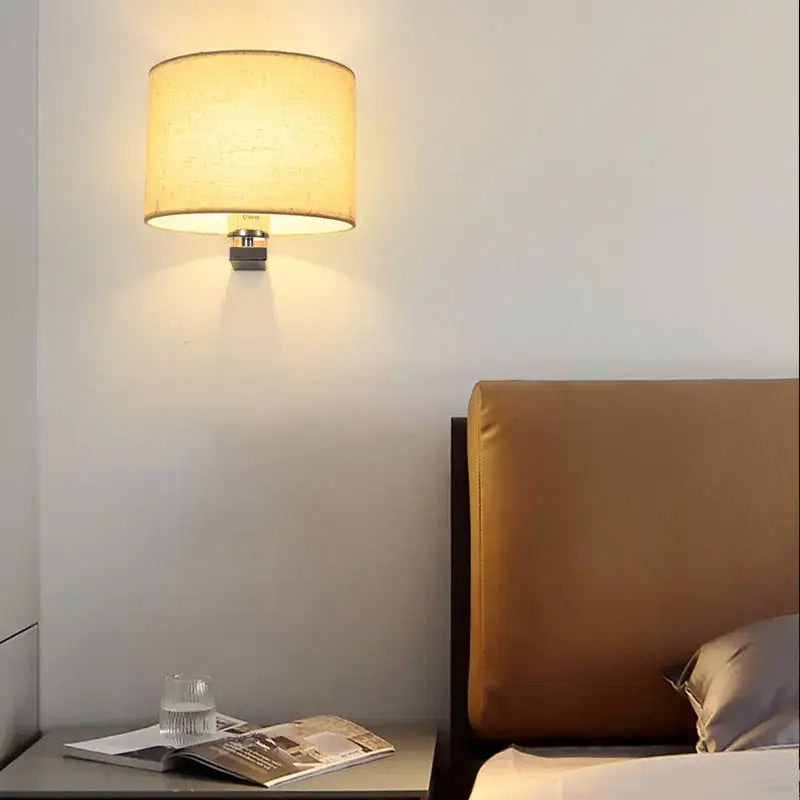 DecorBites™ warm-toned cloth covered wall lamp with textured fabric shade on metallic fixture for bedroom and living room