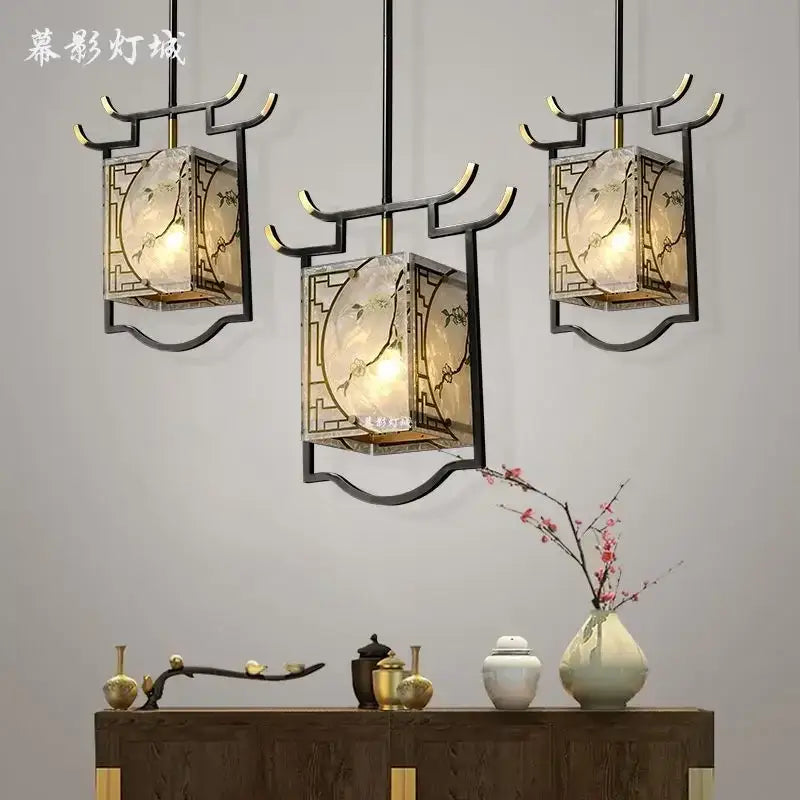 Three elegant black metal lanterns with hand-painted floral glass panels for decorative hall bedroom bedside use