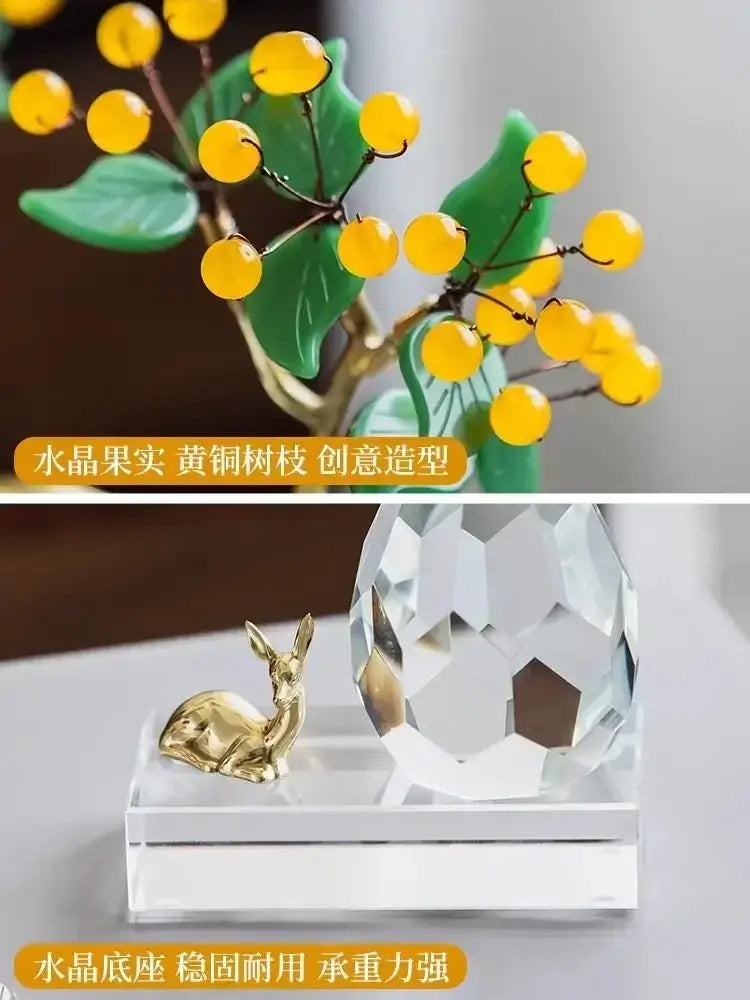 A golden metallic deer figurine beside a faceted crystal sphere on clear acrylic base decorbites chinese style crystal ornaments