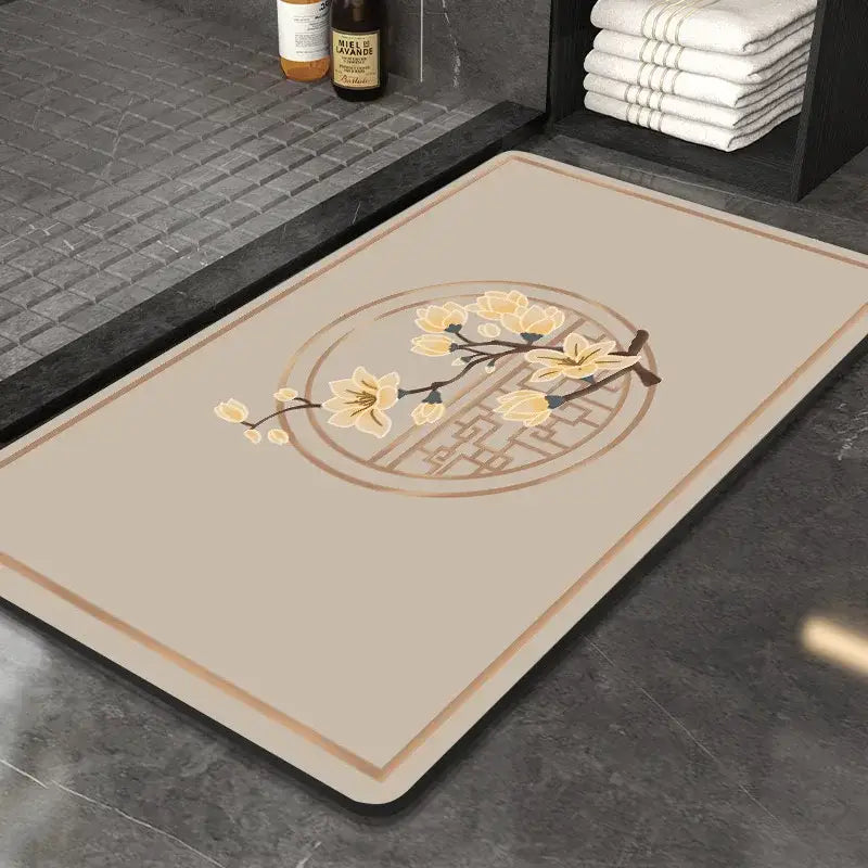 Beige rectangular DecorBites™ Chinese style diatom mud entry door mat with yellow blossoms and geometric design