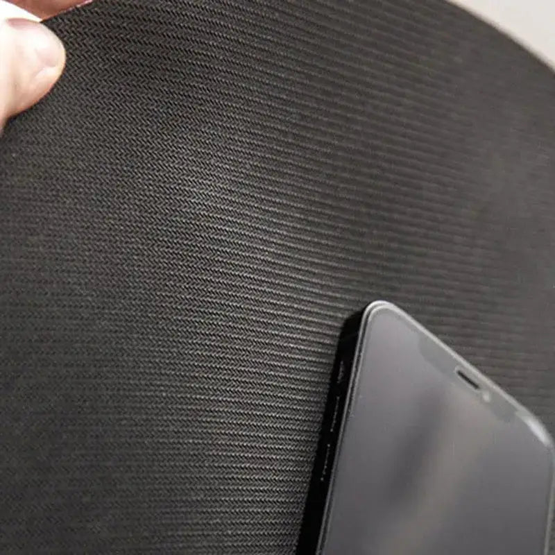 Black textured mousepad with subtle herringbone weave pattern ideal for entry door mat use and anti-slip function