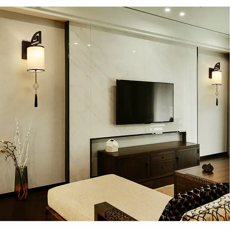 Black-framed decorbites™ chinese style e27 cloth wall sconce with off-white cylindrical shade and black tassel for living room lighting