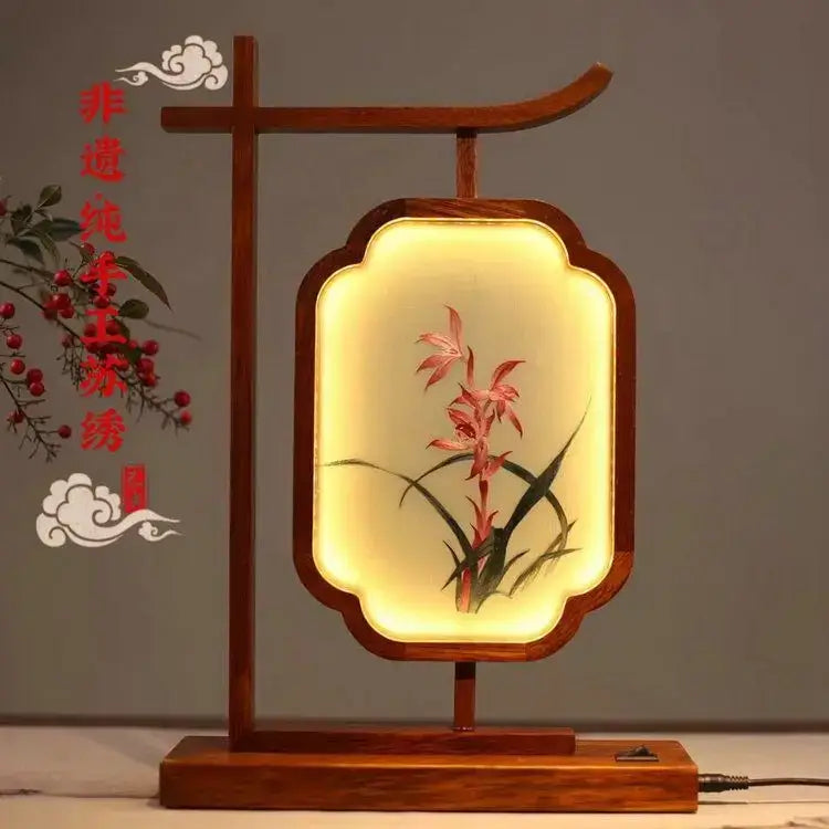 DecorBites™ Chinese style embroidered desk lamp decoration screen with pink orchid embroidery on warm-lit wooden panels