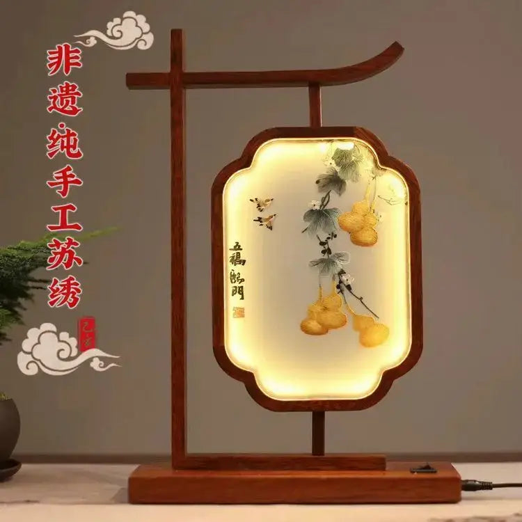 DecorBites™ embroidered desk lamp decoration screen with warm wood frame and intricate golden gourds on silk cream background
