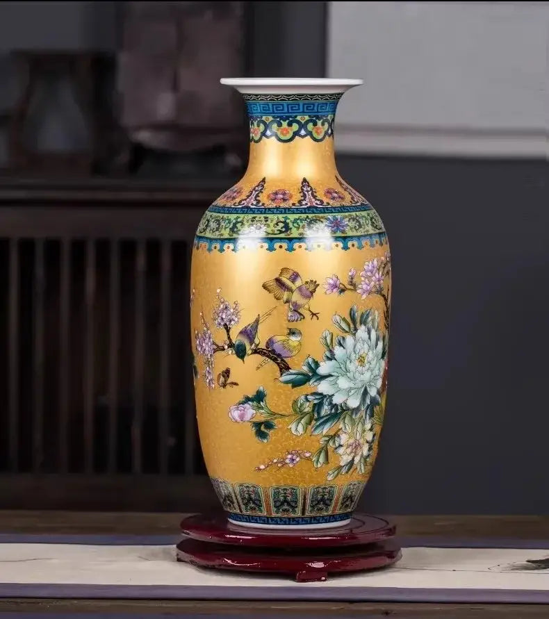 Decorbites™ chinese style golden porcelain enamel colored vase with floral and bird motifs on red wooden stand