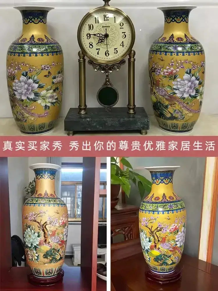 Pair of ornate yellow enamel colored vases with intricate floral bird designs and gold accents in Chinese style by DecorBites