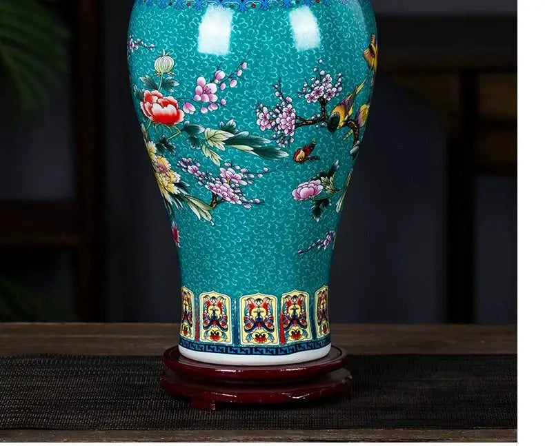 DecorBites™ enamel colored porcelain vase in turquoise with vibrant floral and bird motifs and intricate patterned band
