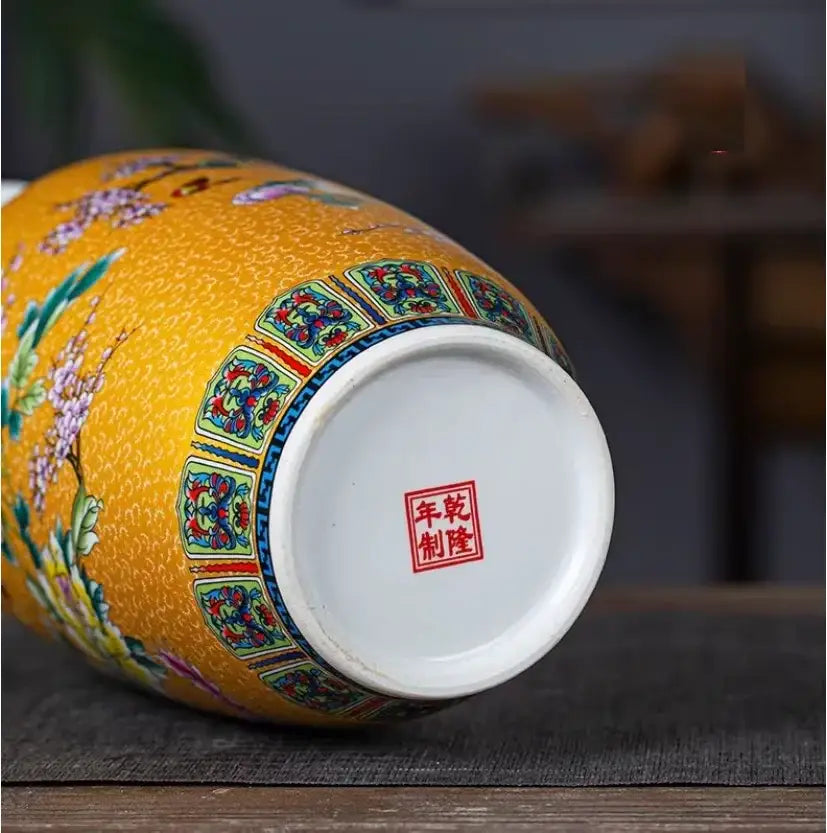DecorBites™ Chinese style yellow porcelain enamel colored vase with intricate multicolored floral patterns and red seal mark