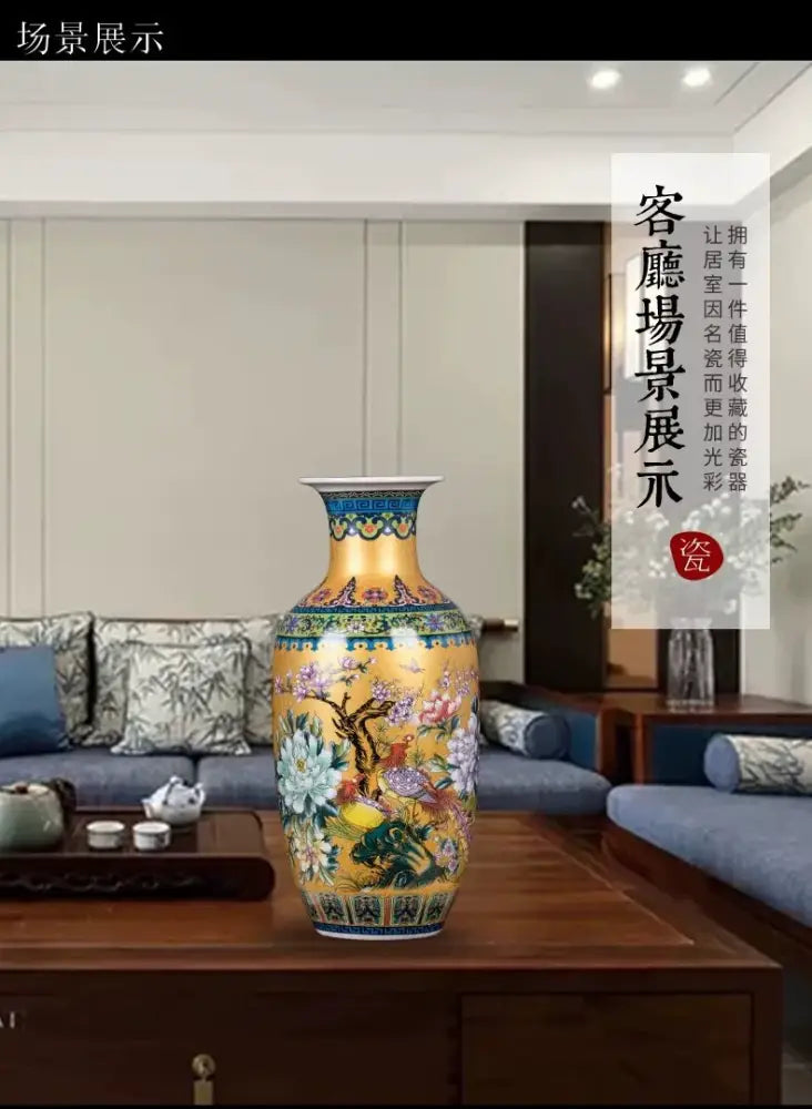 A vibrant yellow porcelain enamel colored vase with intricate floral and bird designs from DecorBites™