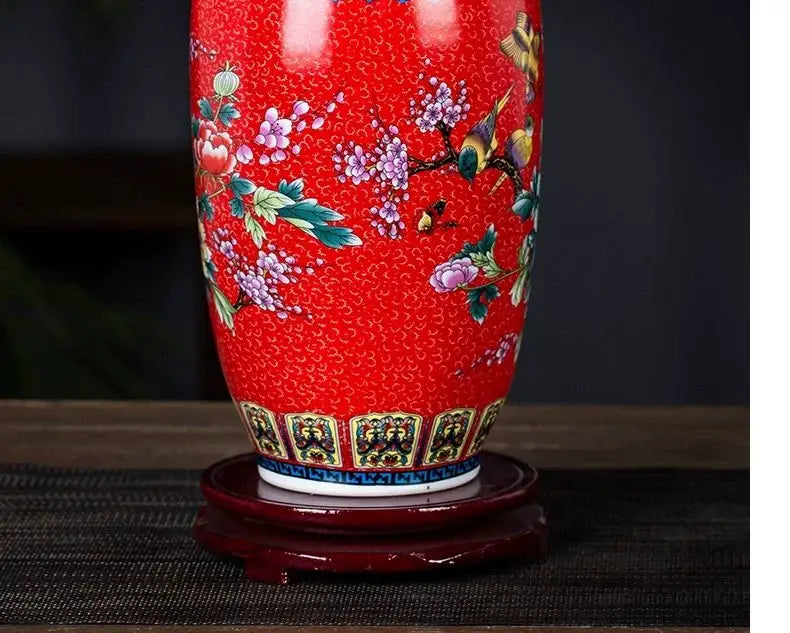 DecorBites™ Chinese style vibrant red enamel colored vase with intricate floral and bird motifs in multiple hues