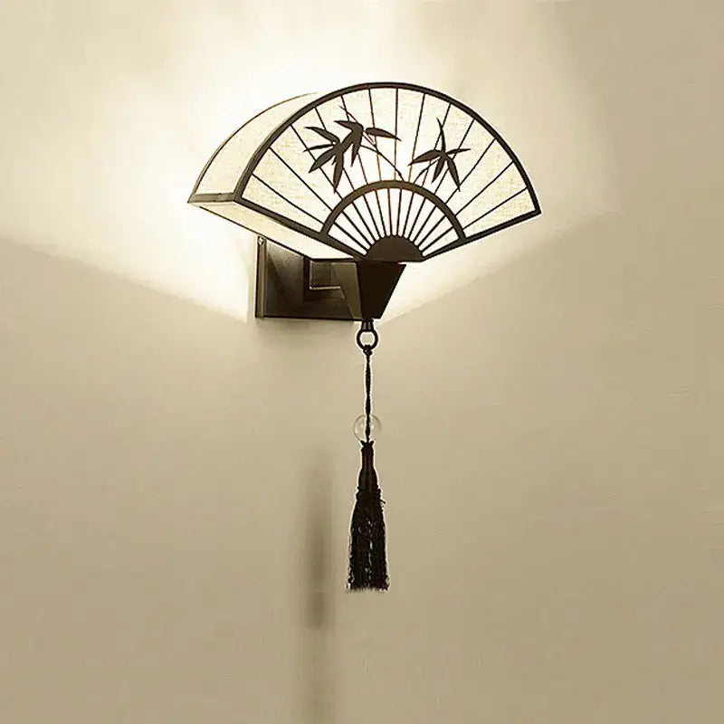 Decorbites™ black iron art wall lamp with fan-shaped bamboo leaf cutouts and tassel for living room and bedroom