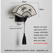 Decorbites chinese style iron art wall sconce in black with fan-shaped bamboo leaf design and black tassel for living room