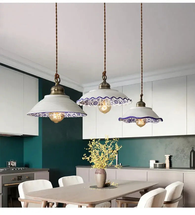 Three white ceramic hanging lamps with blue floral rims and braided copper cords by DecorBites Chinese style porcelain