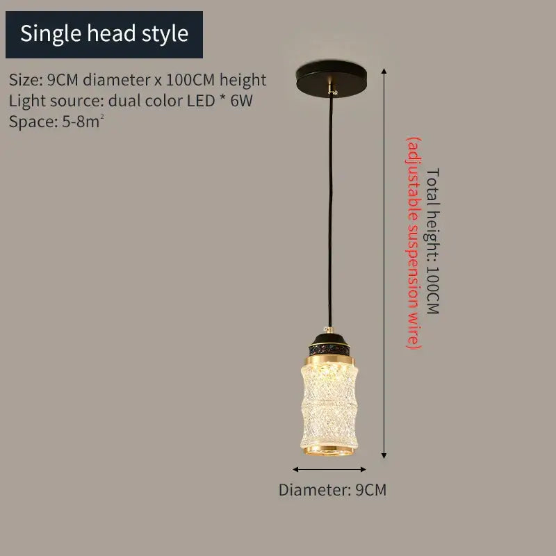A gold-toned crystal-encrusted pendant light for decorbites spiral staircase chandelier in villa and restaurant settings