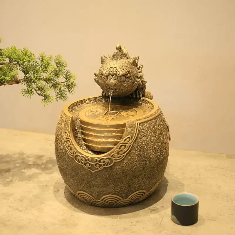 Bronze ceramic decorbites chinese style desktop fountain with lion head spouting water and traditional wave motifs