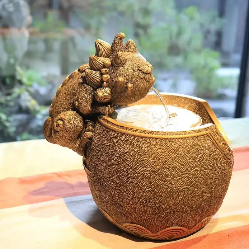 Bronze-colored ceramic dragon fountain spouting water into textured bowl decorbites chinese style wealth attracting ornament