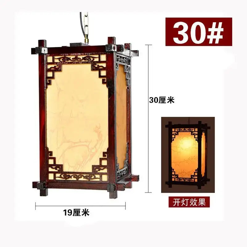 DecorBites Chinese style wood pendant light with dark reddish-brown frame and amber glass panels emitting warm glow