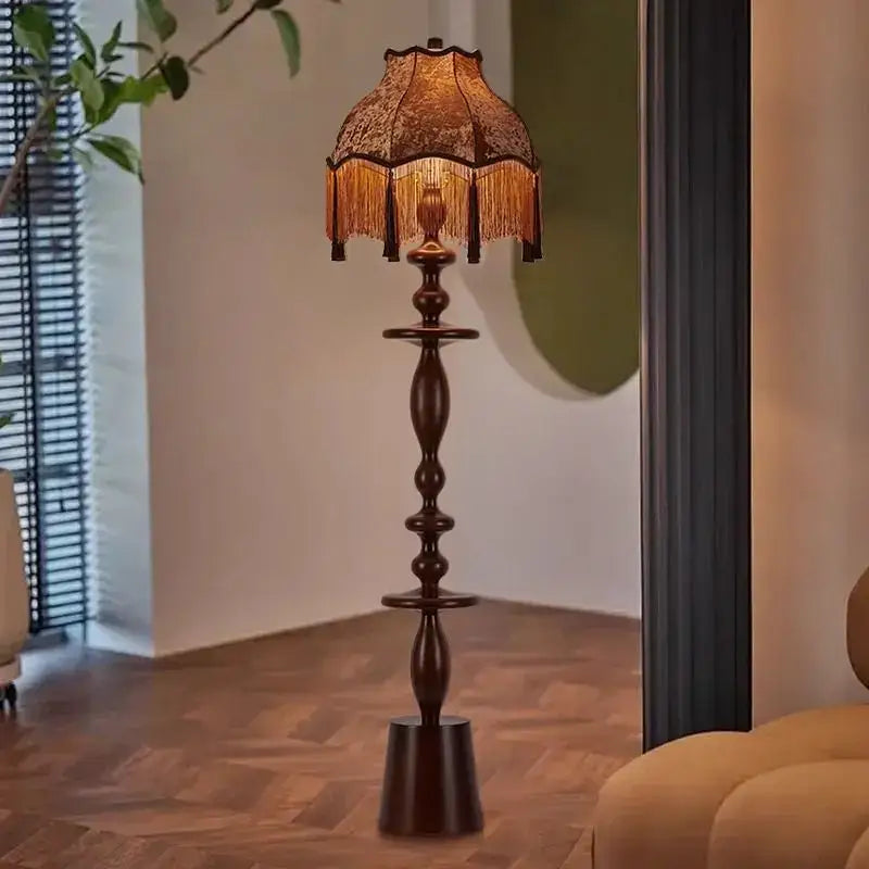 Antique-style wooden floor lamp with warm-toned lace shade and golden tassels from decorbites chinese tassels floor collection