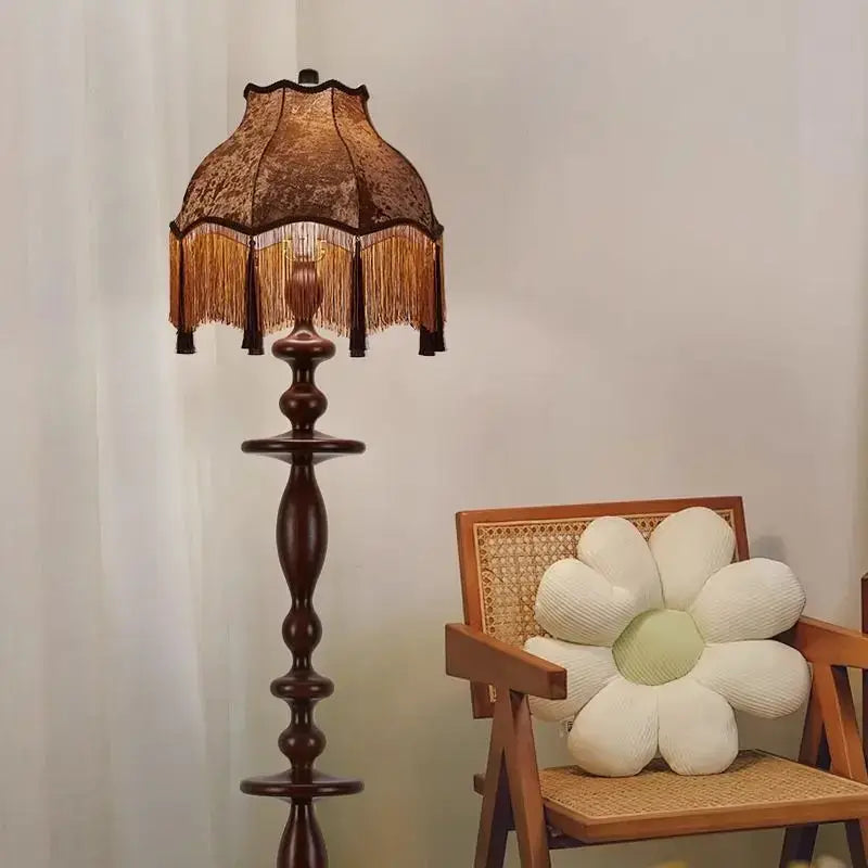 DecorBites chinese tassels floor lamp with dark wood base and lace-patterned gold-fringed shade for warm lighting