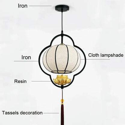 Black iron teahouse lantern chandelier with cream cloth shade gold resin lotus base and dark red tassels for dining room