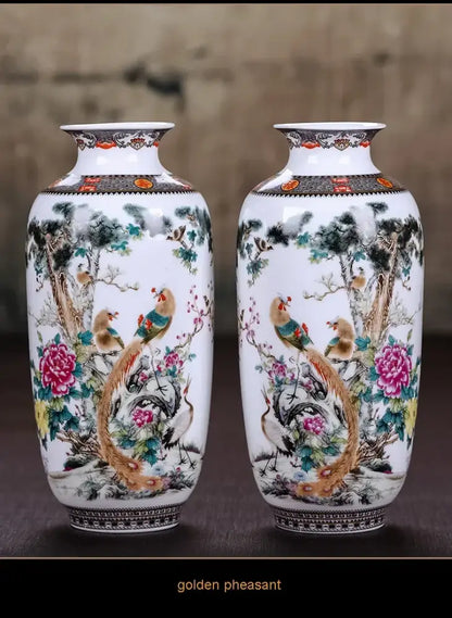 Pair of white porcelain chinese traditional ceramic vases with hand-painted golden pheasants and peonies for home decor