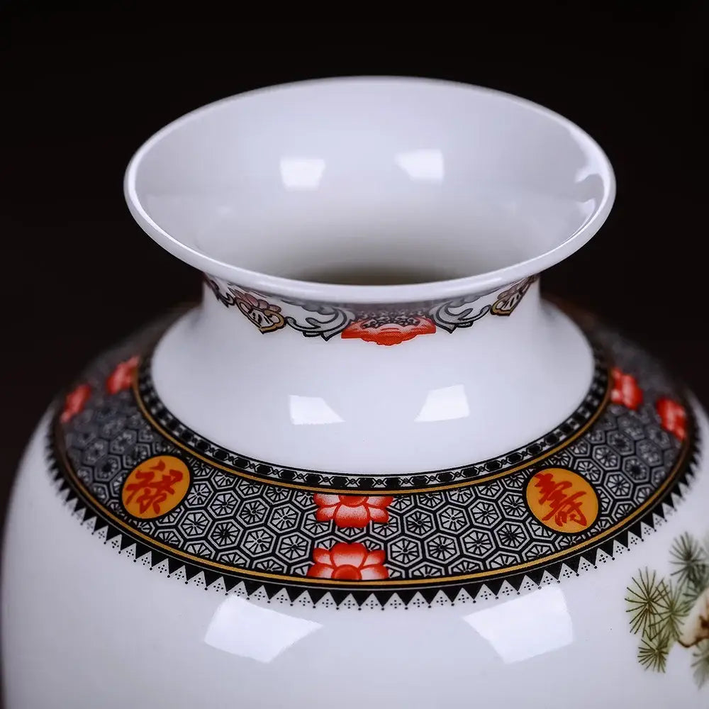 A white ceramic DecorBites™ vase with black red gold floral motifs and chinese traditional characters for home decor
