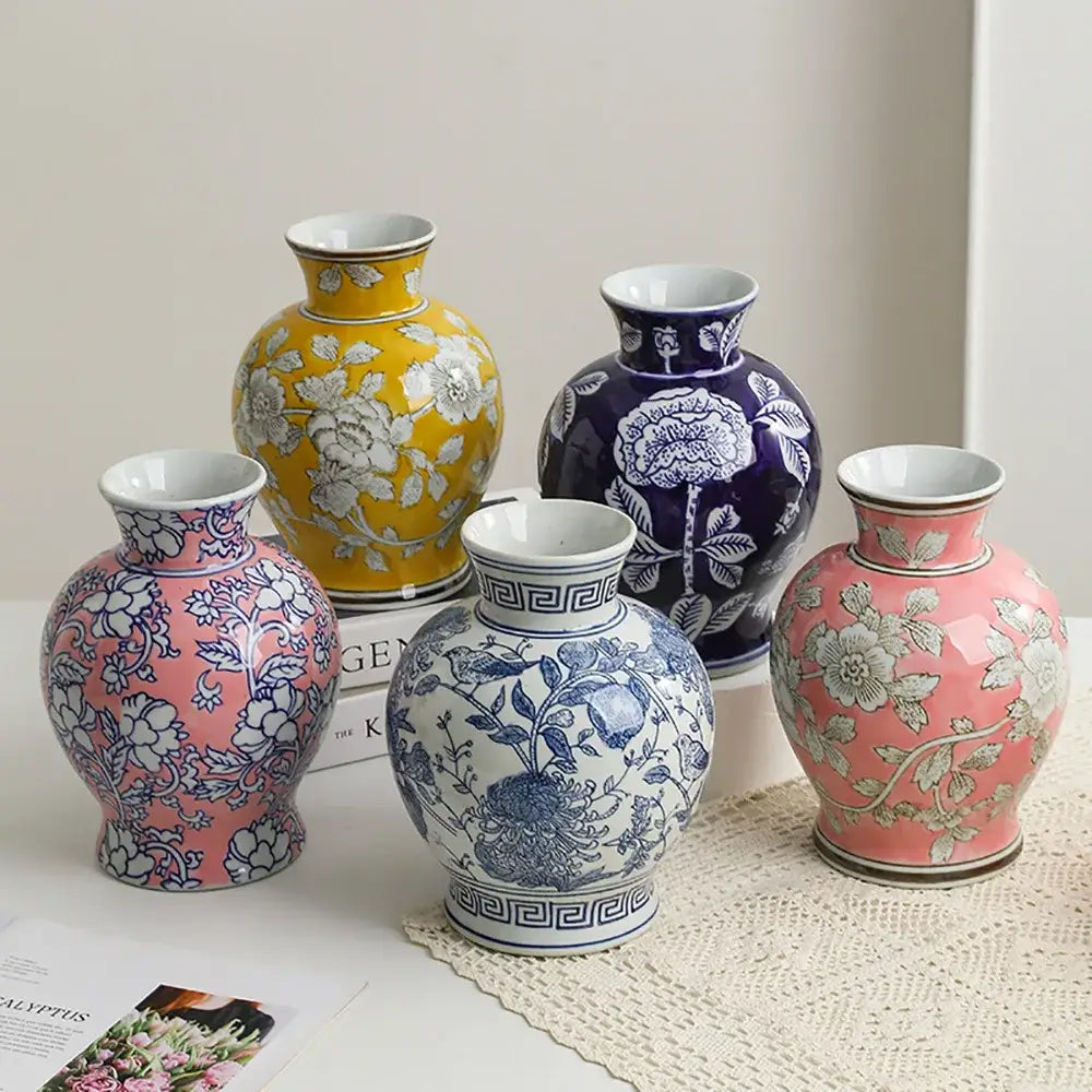 Set of five colorful ceramic vases featuring vintage blue white porcelain floral and geometric patterns for home decor
