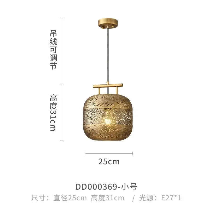 Gold-toned art birdcage pendant light with intricate perforated metalwork for zen decor in restaurant or tea room