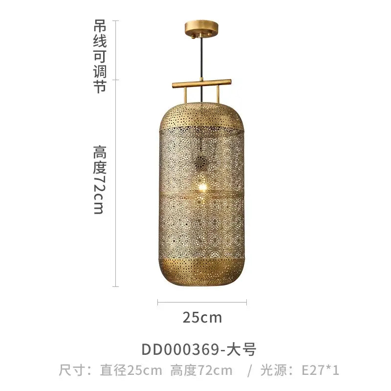 Gold-toned cylindrical pendant light with intricate perforated metalwork and brass ceiling mount decorbites zen art birdcage