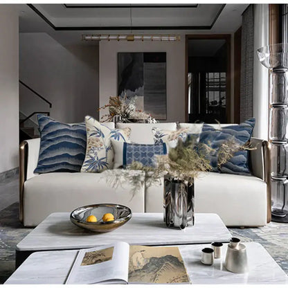 White sofa with gold-tone armrests and blue DecorBites™ chinoiserie decor throw pillow cover 45x45cm for living room