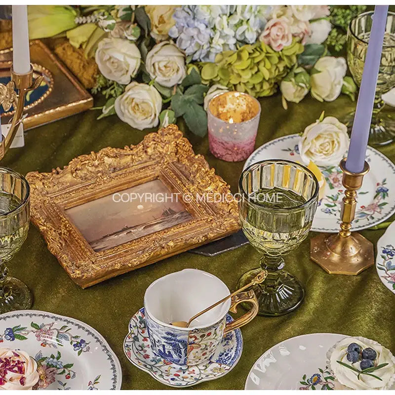 Gold ornate picture frame with intricate detailing and a rectangular opening for decorbites chinoiserie floral birds display