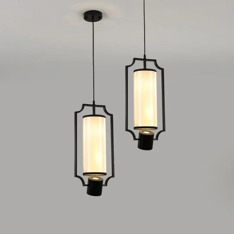 Decorbites chinoiserie retro chandelier with black framed pendant lights and warm frosted glass shades for dining room
