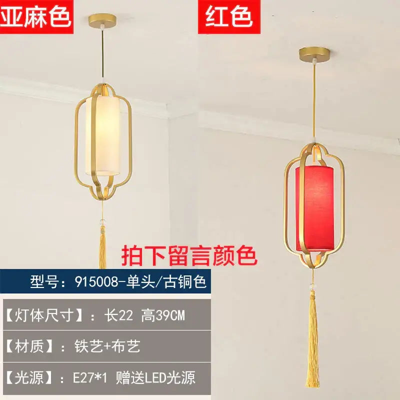 Gold-toned lantern-style pendant light with fabric shade and tassel in decorbites chinoiserie retro chandelier design