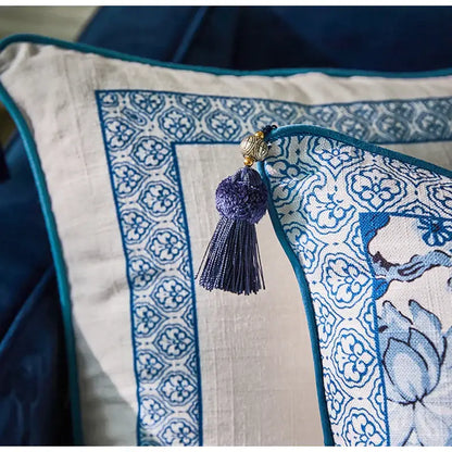 DecorBites™ chinoiserie style lumbar pillow case with blue and white porcelain birds pattern teal border and purple tassel accent