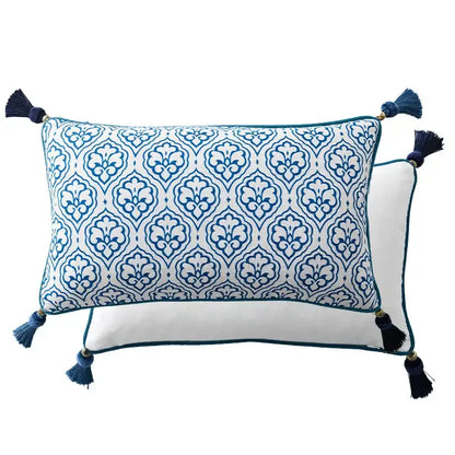 Rectangular lumbar pillow case with white base blue floral porcelain bird pattern and navy tassels by decorbites