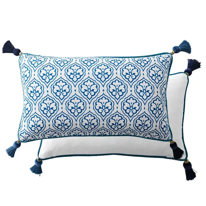 Rectangular lumbar pillow case with white base blue floral porcelain bird pattern and navy tassels by decorbites