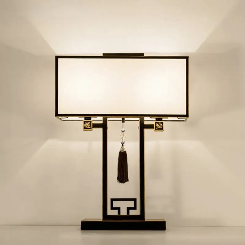 Black-framed decorbites chinoiserie style floor lamp with white fabric shade and gold accents for living room or bedroom