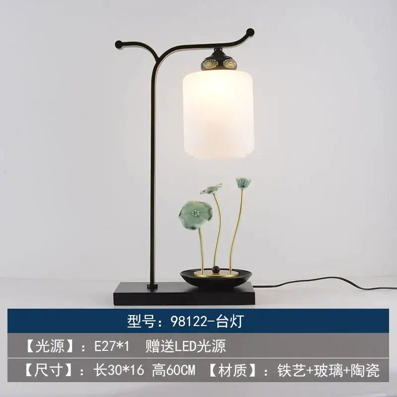 Black iron floor lamp with frosted glass shade and ceramic lotus decor by decorbites chinoiserie table floor lamp