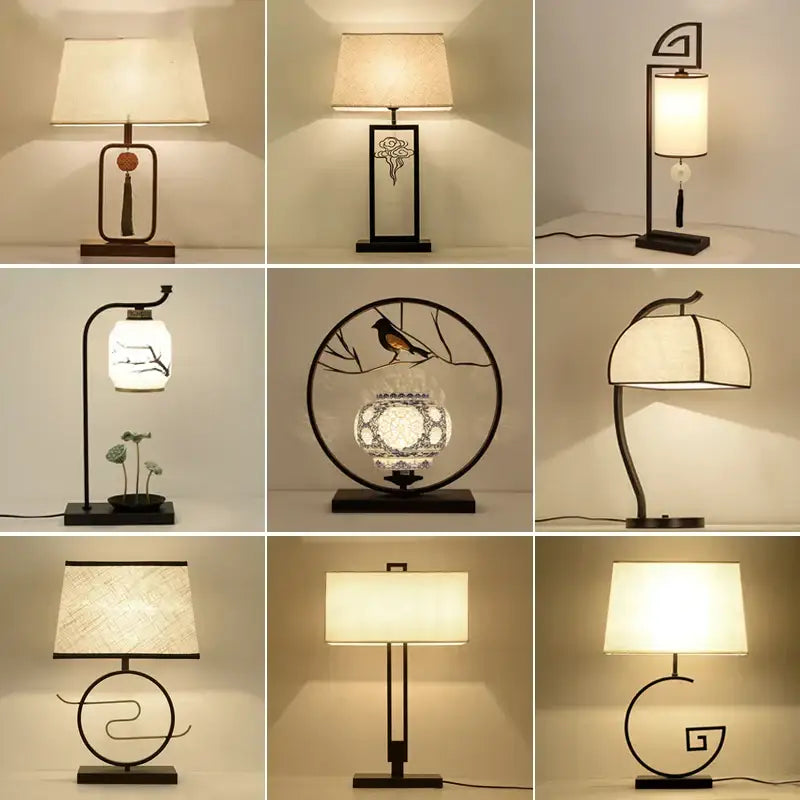 A collection of nine decorbites chinoiserie table floor lamps with black metal frames and cream fabric shades for elegant lighting