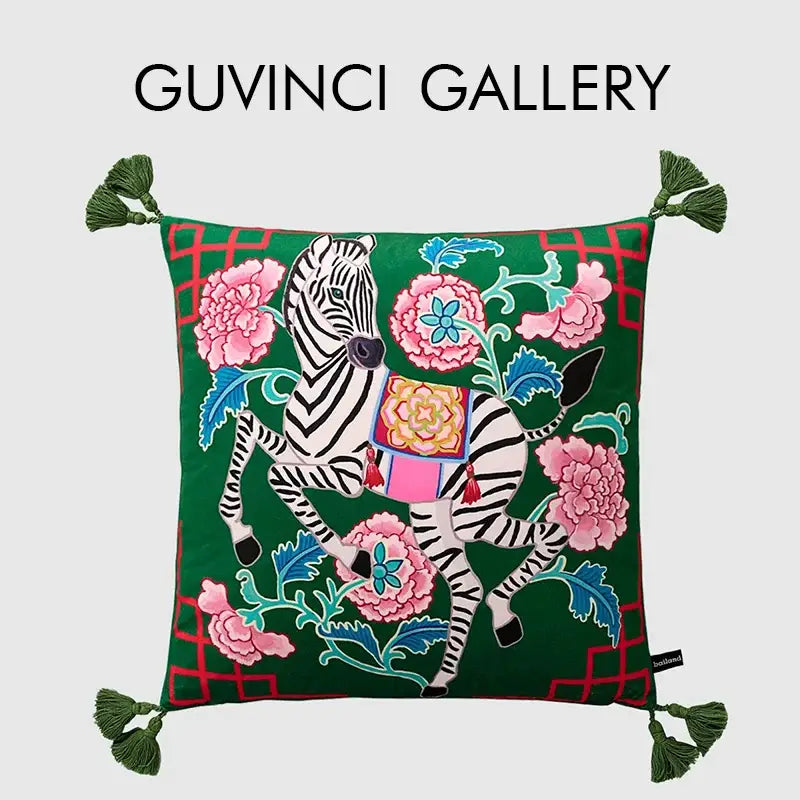 Green embroidered cushion cover with black-and-white zebra, pink peonies, red lattice, and green tassels by decorbites chinoiserie zebra