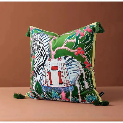 Green velvet cushion cover featuring an embroidered decorbites chinoiserie zebra with peonies and green tassels