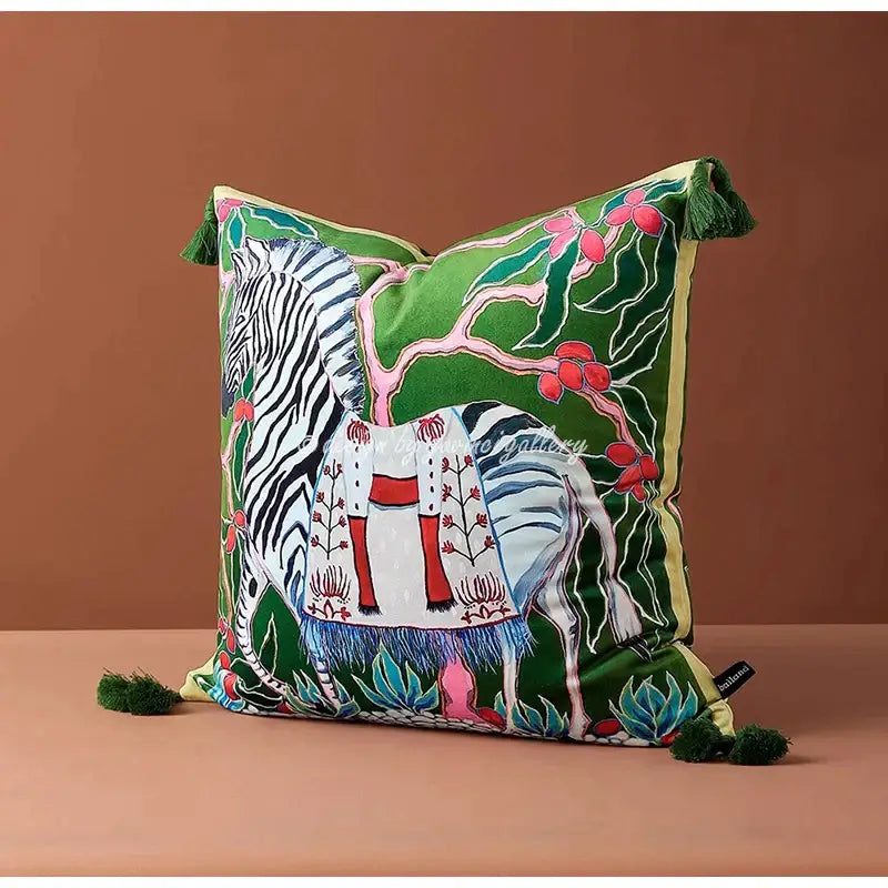Green velvet cushion cover featuring an embroidered decorbites chinoiserie zebra with peonies and green tassels