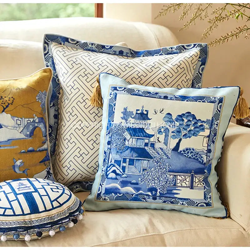 Decorbites chintz blue cobalt circular throw pillow cover with blue and white porcelain-style embroidery and tassels
