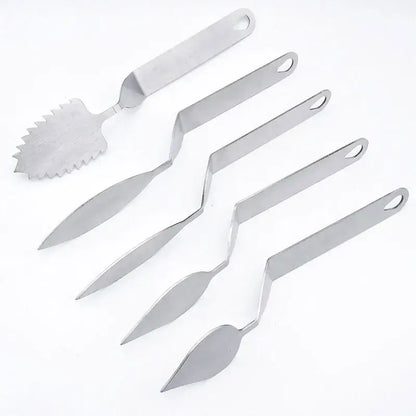 Set of six stainless steel decorbites chocolate leaf knives with varied blade shapes including serrated leaf knife fondant tool