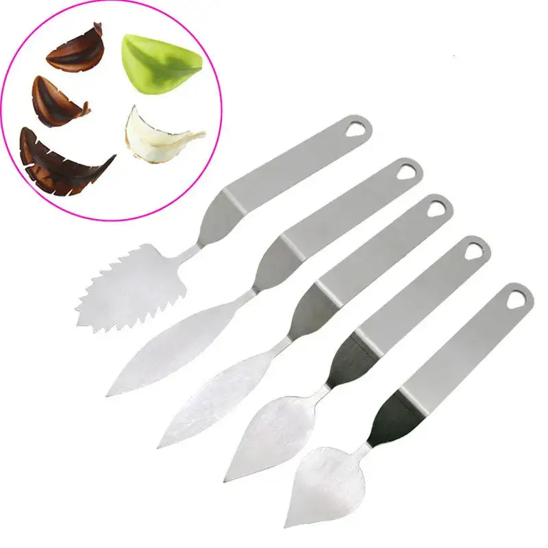 Set of five stainless steel garlic peeling tools with black handles featured in decorbites chocolate leaf knife fondant tool set