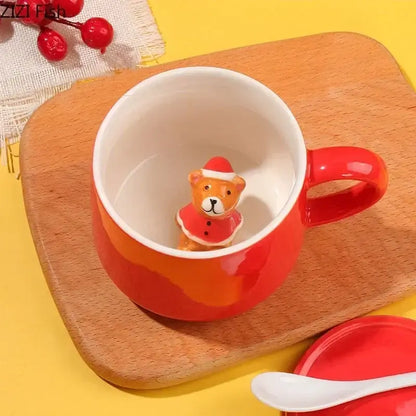 Red porcelain mug with glossy orange gradient featuring a santa-clad bear figurine in a christmas animals ceramic set