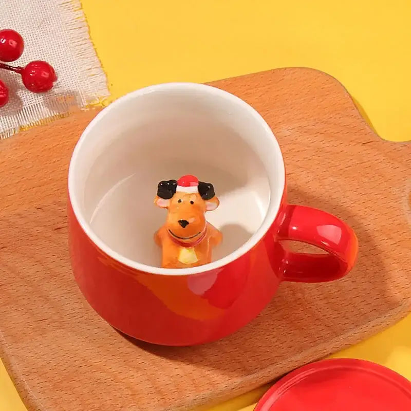 Decorbites™ christmas animals ceramic red porcelain mug with white interior and orange reindeer figurine inside