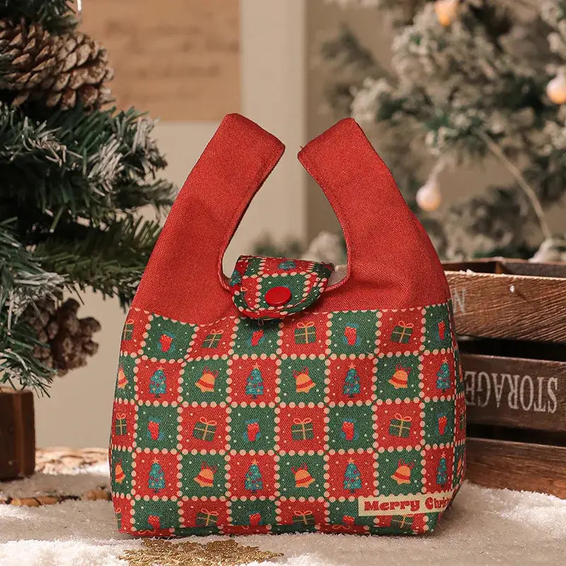 Red and green christmas themed fabric gift bag with tree bell and gift patterns decorbites christmas apple handheld