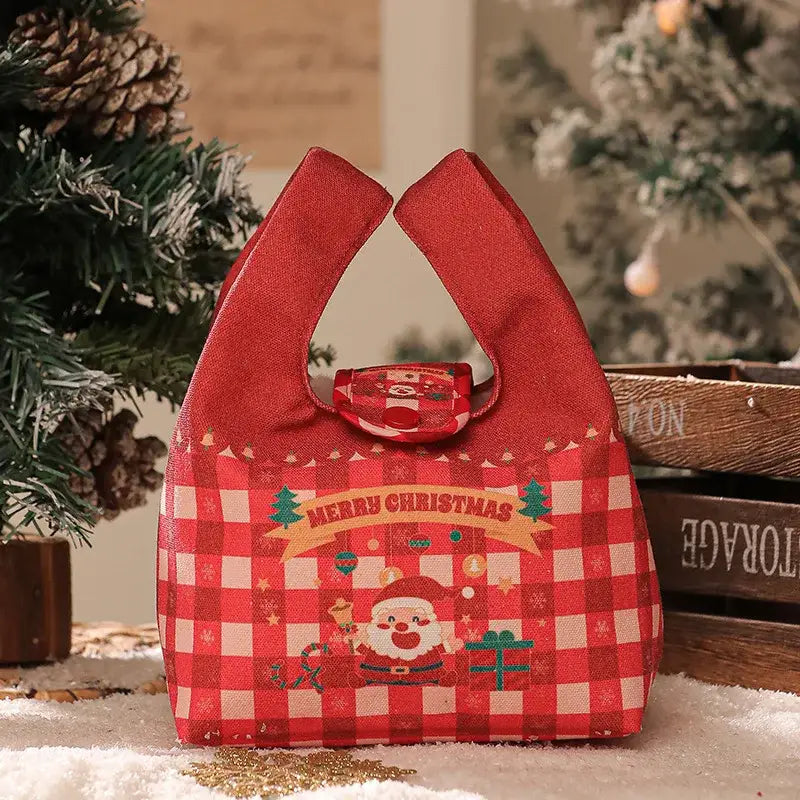 Red and white checkered christmas apple handheld gift bag by decorbites featuring santa claus and merry christmas text