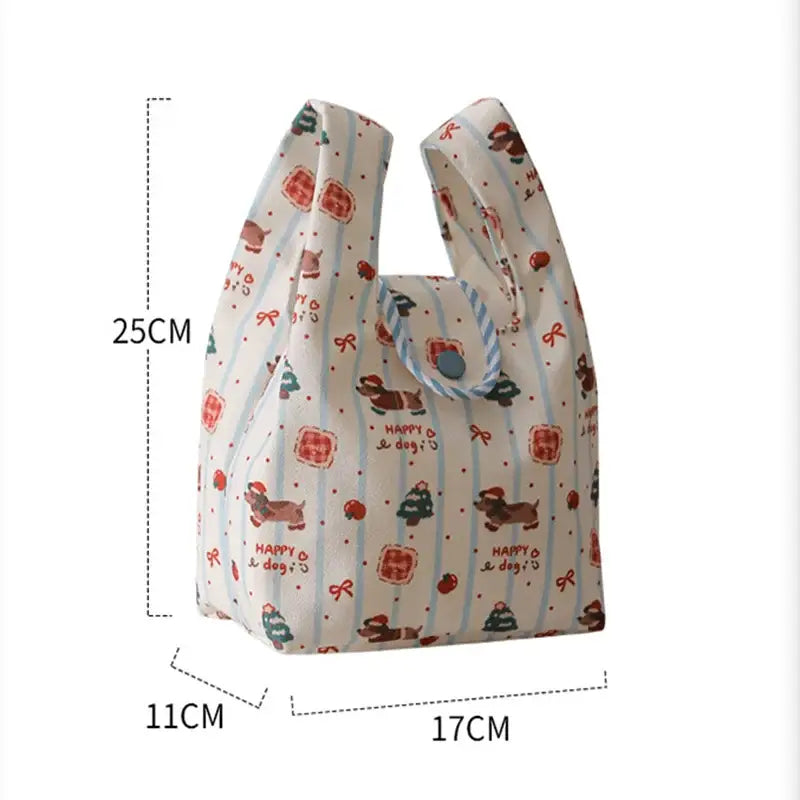 Festive white plush decorbites christmas apple handheld gift bag with red green prints and cartoon dogs in santa hats